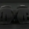 Predator Series black accent 14oz boxing gloves shown from the knuckle front angle.