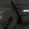 Close-up of the Predator Series pink accent 10oz ladies boxing gloves showing claw-mark detailing.