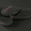 Side profile of the Predator Series pink accent 10oz womens boxing glove showing series branding.