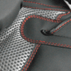 Close-up of the Predator Series boxing gloves palm area showing mesh ventilation and red stitching.