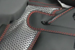 Close-up of the Predator Series boxing gloves palm area showing mesh ventilation and red stitching.