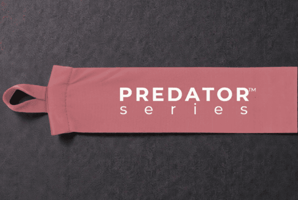 Predator Series pink 4.5m womens hand wrap shown extended with thumb loop and Predator branding.