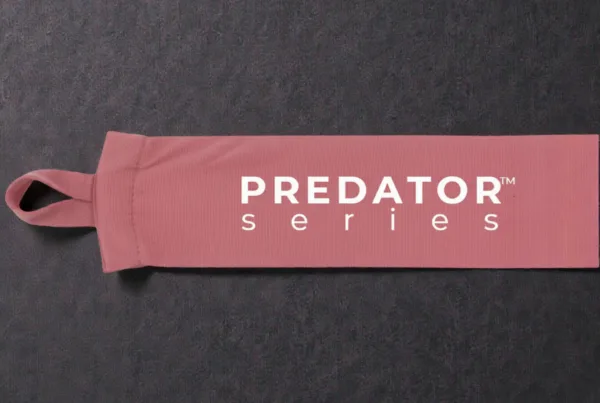 Predator Series pink 4.5m womens hand wrap shown extended with thumb loop and Predator branding.