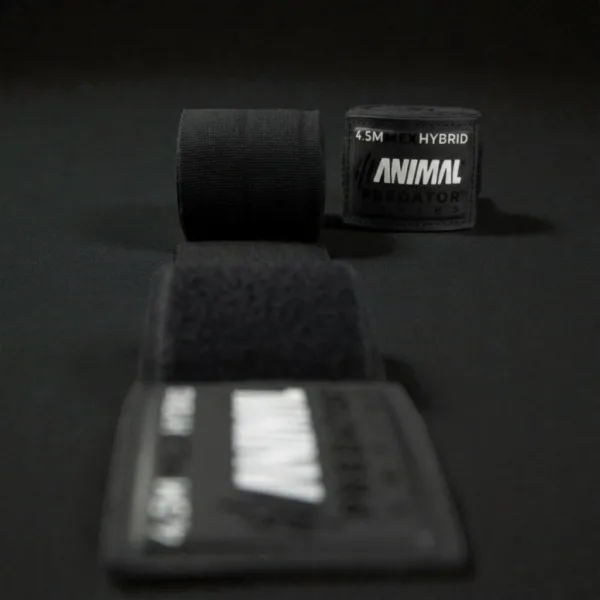 Black Predator Series boxing hand wrap unrolled towards the camera with the label upright in the background.
