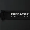 Black Predator Series boxing hand wrap laid flat showing thumb loop and starting end.
