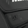 Close-up of the HexLayer padding logo on the Predator Series black accent boxing gloves.