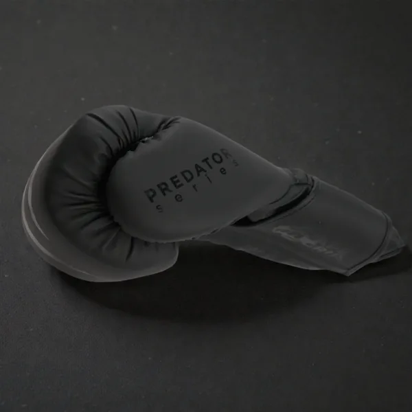Side profile of the Predator Series black accent boxing glove showing the Predator Series branding.